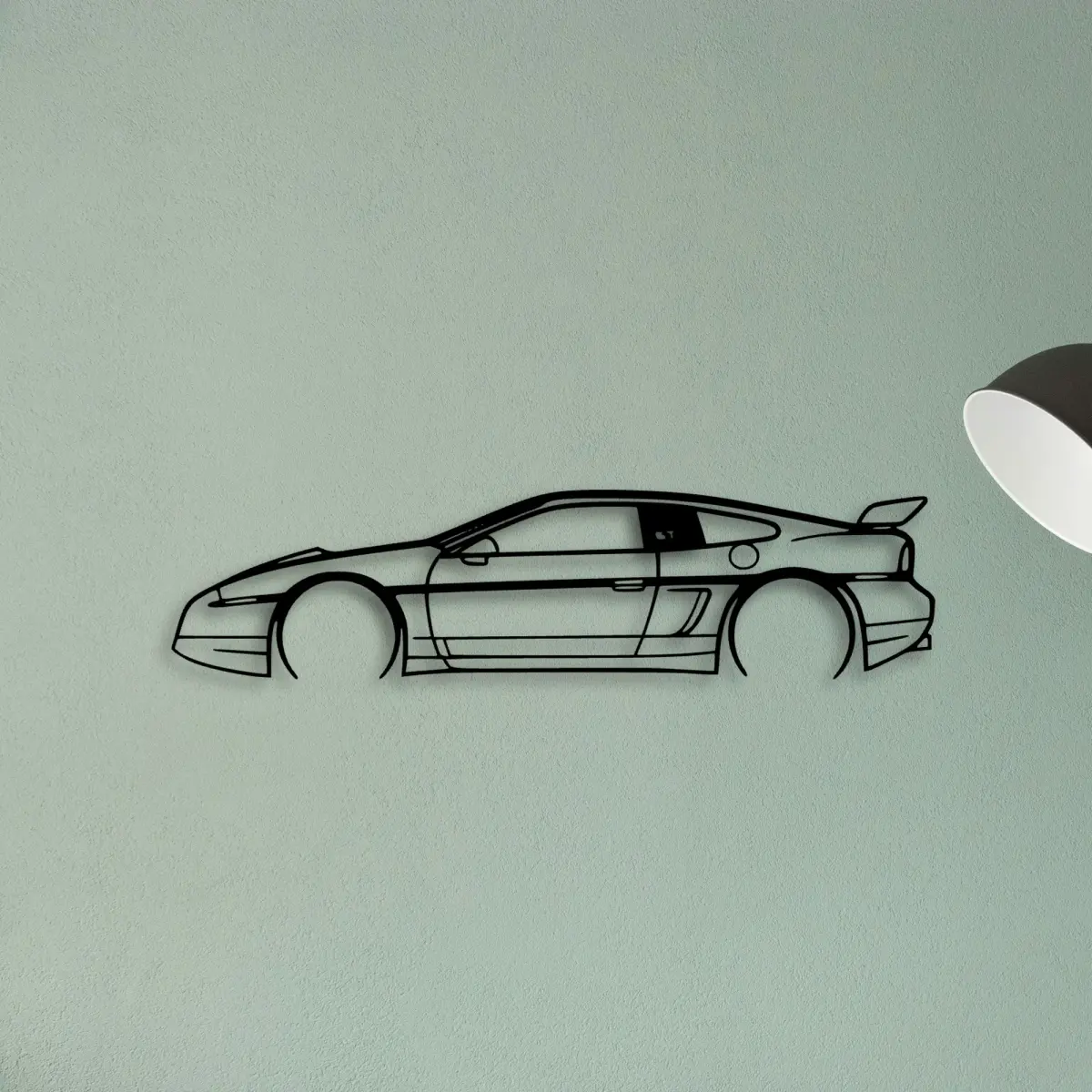 Side-profile metal wall art of the Fiero GT 1987, a 1980s sports car silhouette