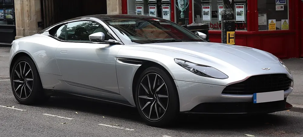 Aston Martin DB11 2 — cut-metal silhouette in clean-sided form