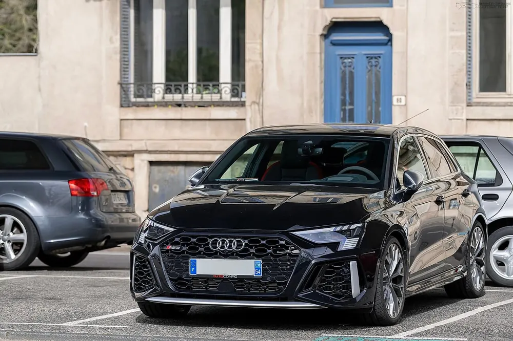 Audi RS3 Sportback 8Y — cut-metal silhouette in clean-sided form