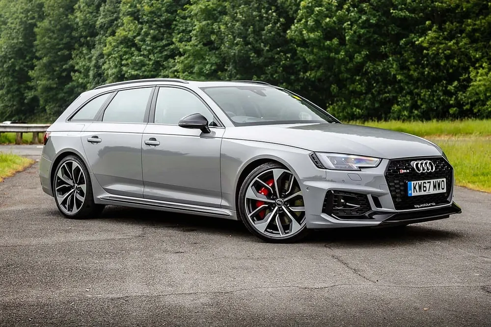 Audi RS4 Avant — cut-metal silhouette in long-roof estate form