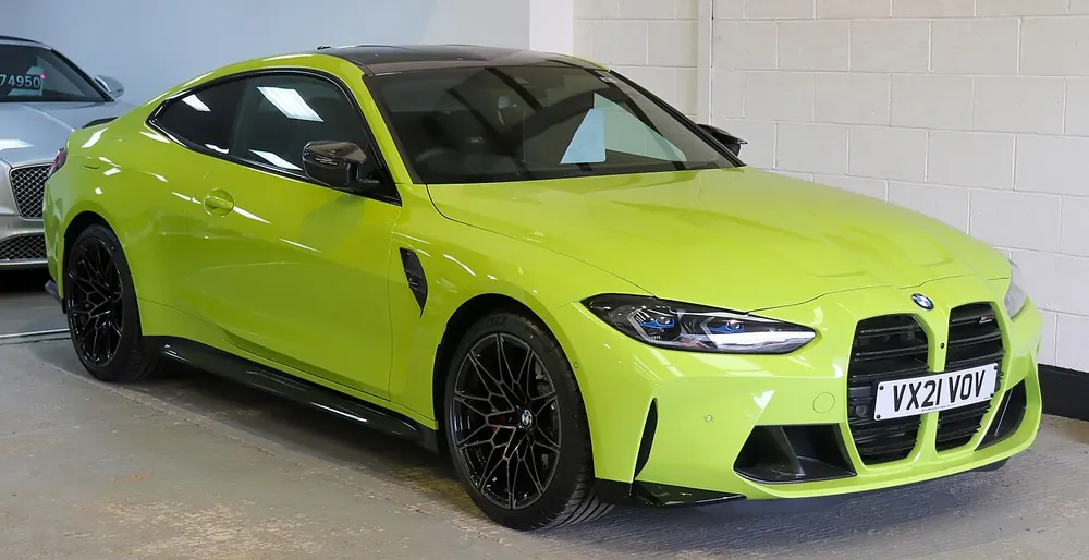BMW M4 Convertible — cut-metal silhouette in open-top form