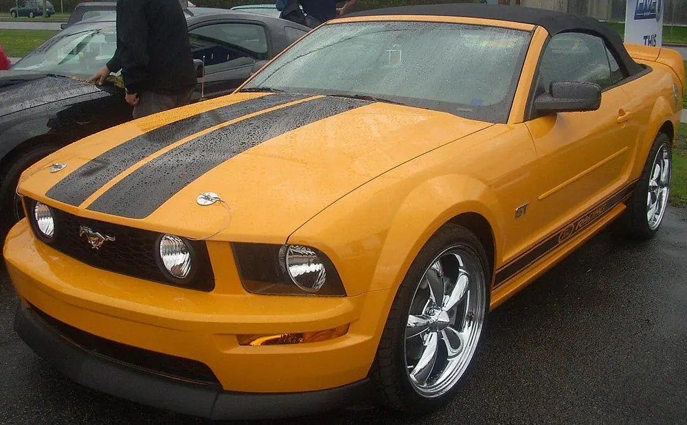 Ford Mustang GT Convertible — cut-metal silhouette in open-top form
