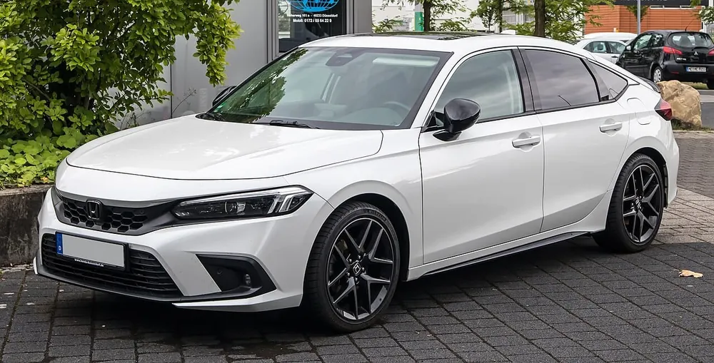 Honda Civic Coupe — cut-metal silhouette in closed two-door form