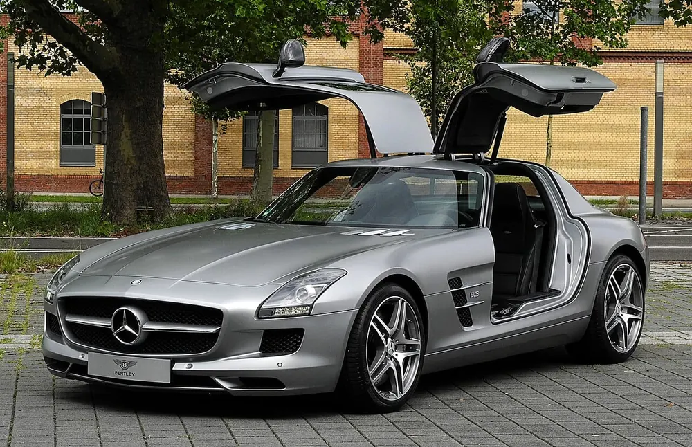 Mercedes-Benz SLS AMG — cut-metal silhouette in clean-sided form