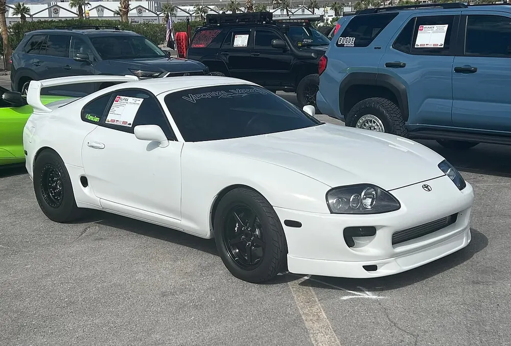 Toyota Supra MK4 — cut-metal silhouette in clean-sided form
